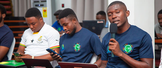 Youth NREG members at a microphone