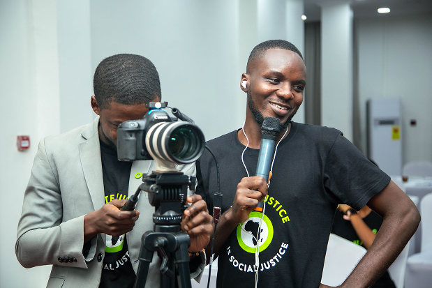 SYND media team recording with camera and microphone
