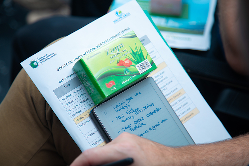 YGE member reviewing a green product and notes